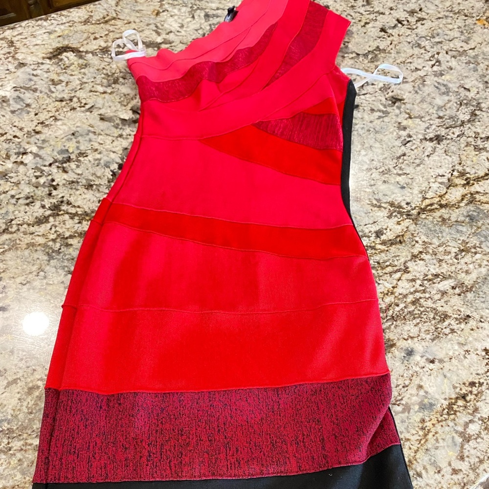 Handmade dress by Fortuna.